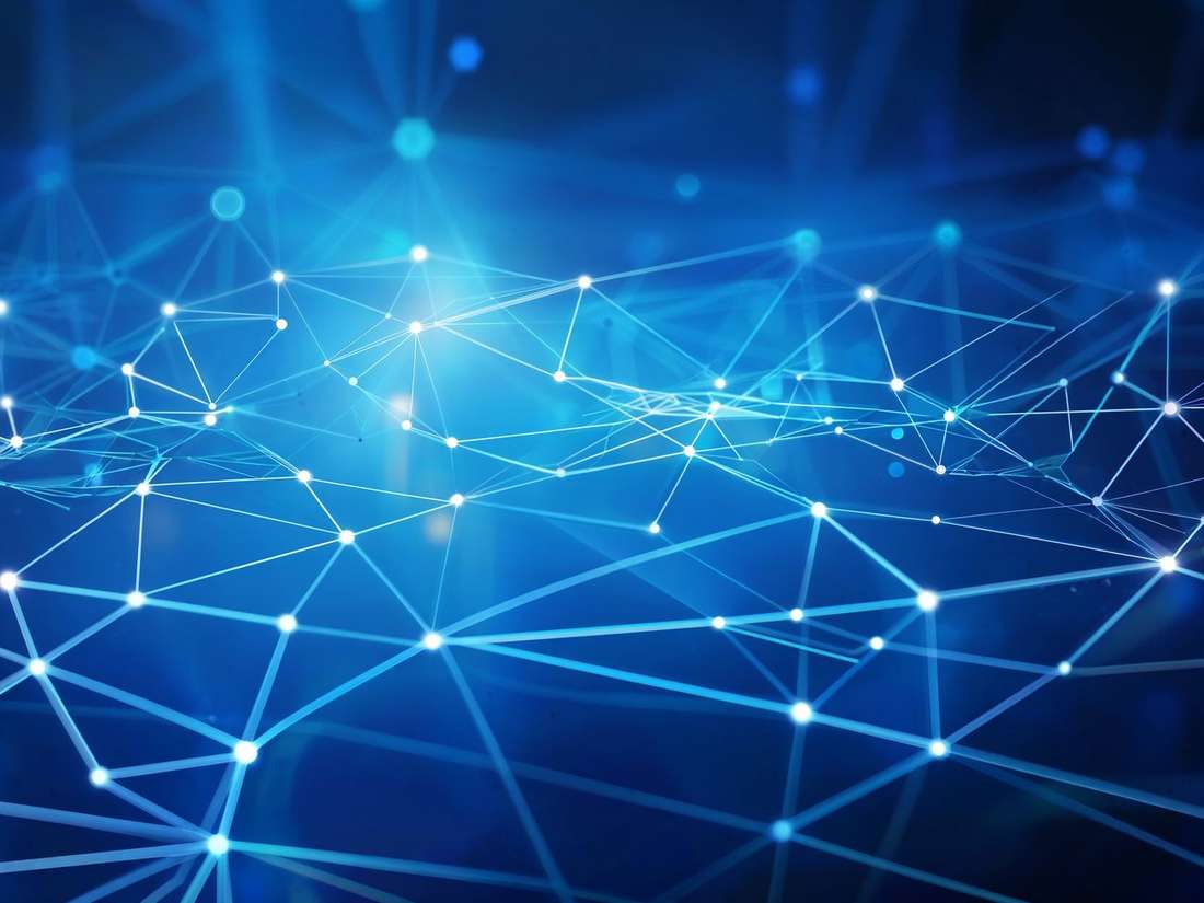 A glowing blue network of connected points, like a map of how AI links information
